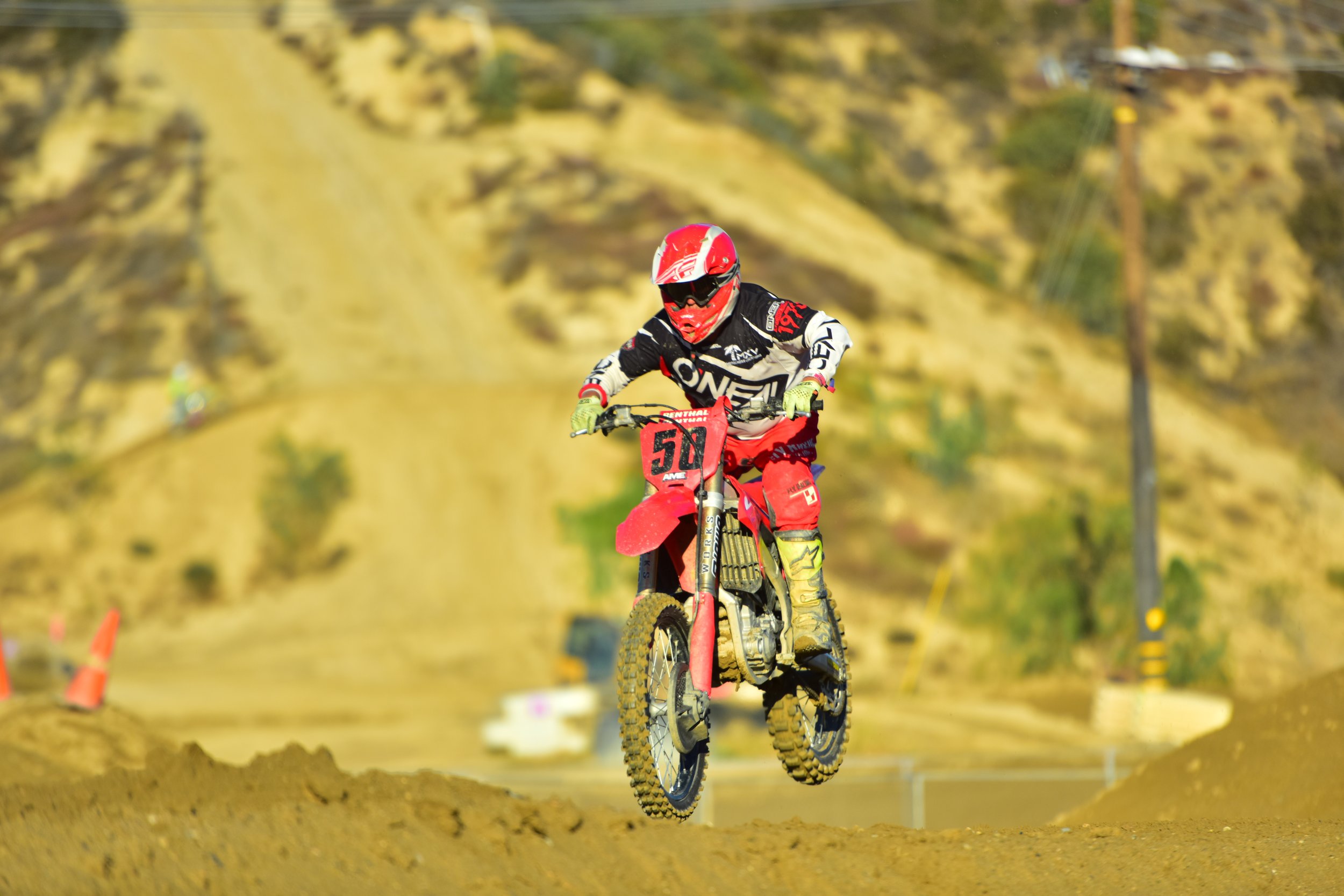 MX Vacations rider accelerating out of a turn on a SoCal track